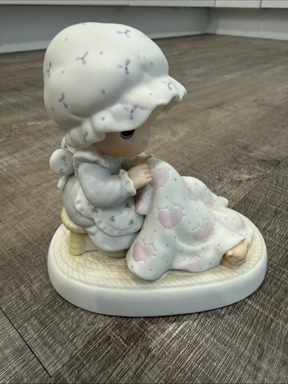 Precious Moments Porcelain figurine.  Love Covers All.   1984
